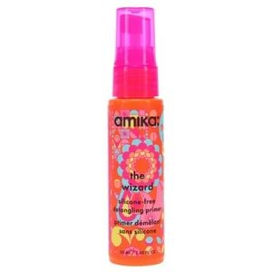 amika The Wizard Detangling Primer - Pink & Orange Bottle